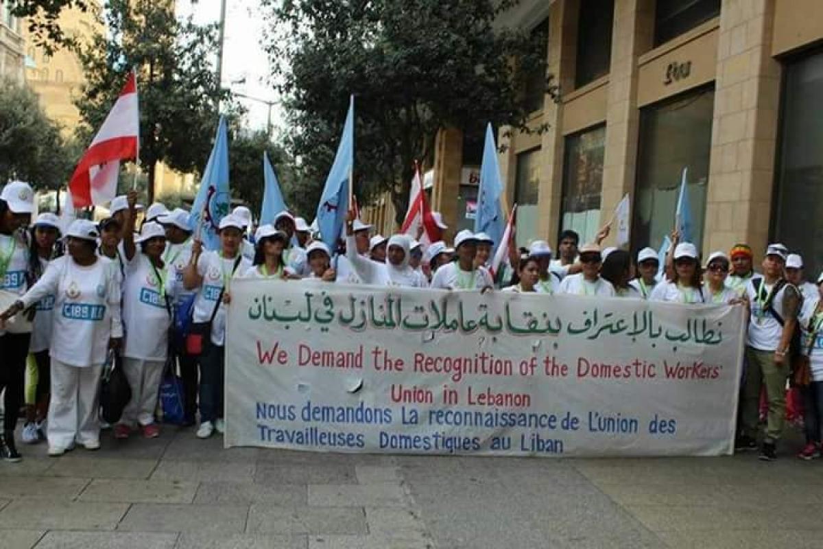 "Maratón, 2016", fotografía de FENASOL. Trabajadors participando en el maratón de Beirut exigiendo la ratificación del Convenio 189 de la OIT en el trabajo doméstico.